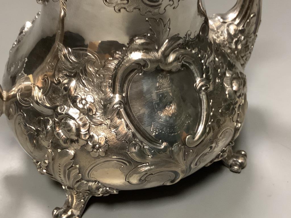 A Victorian embossed silver coffee pot, by George Ivory, London 1857 height 18.2 cm